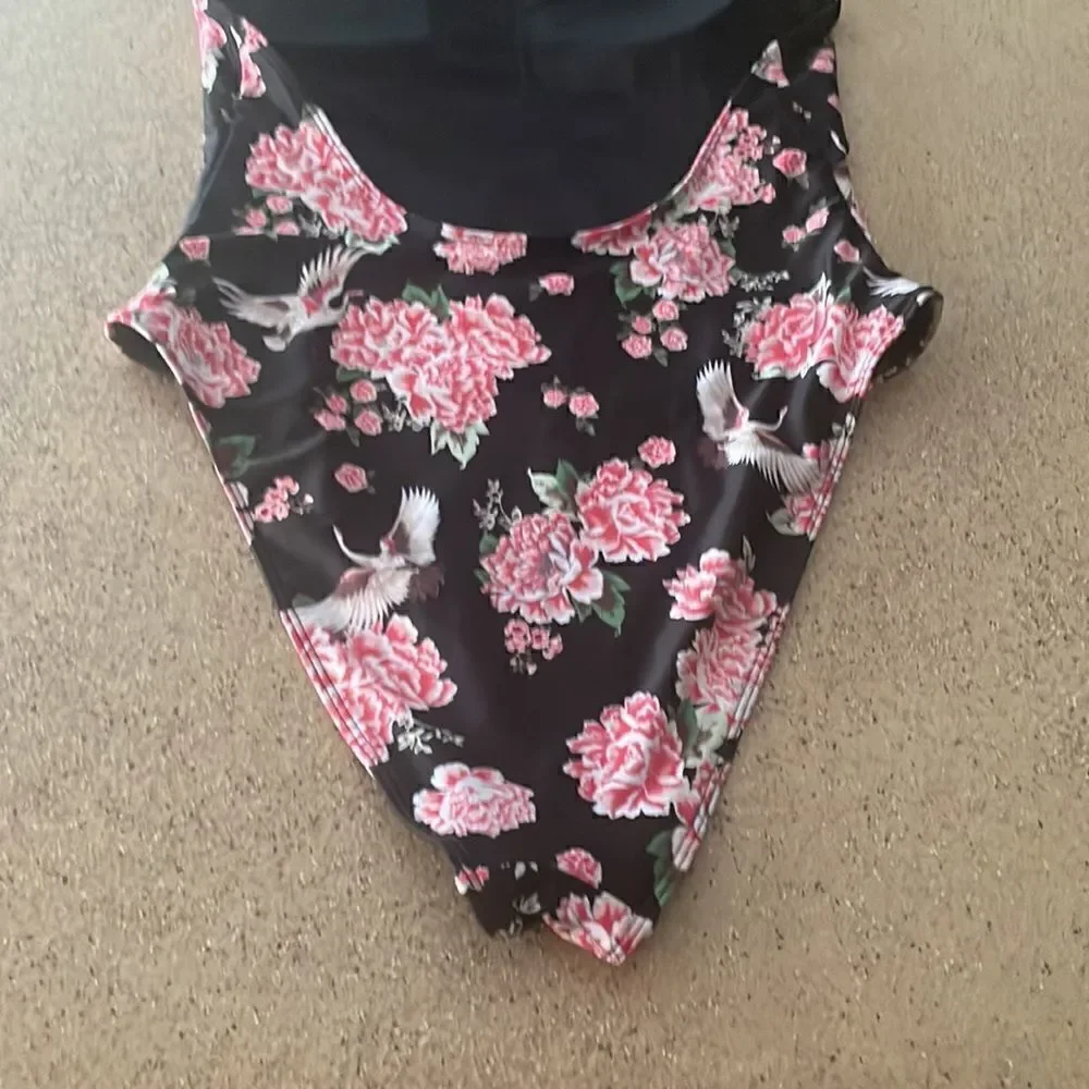Black halter neck one piece swimsuit with roses and cranes print
